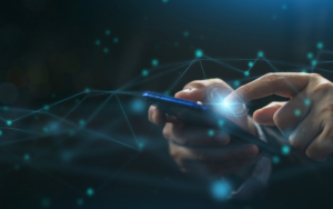 Side View Of Person Typing On Phone With Futuristic Node Overlay