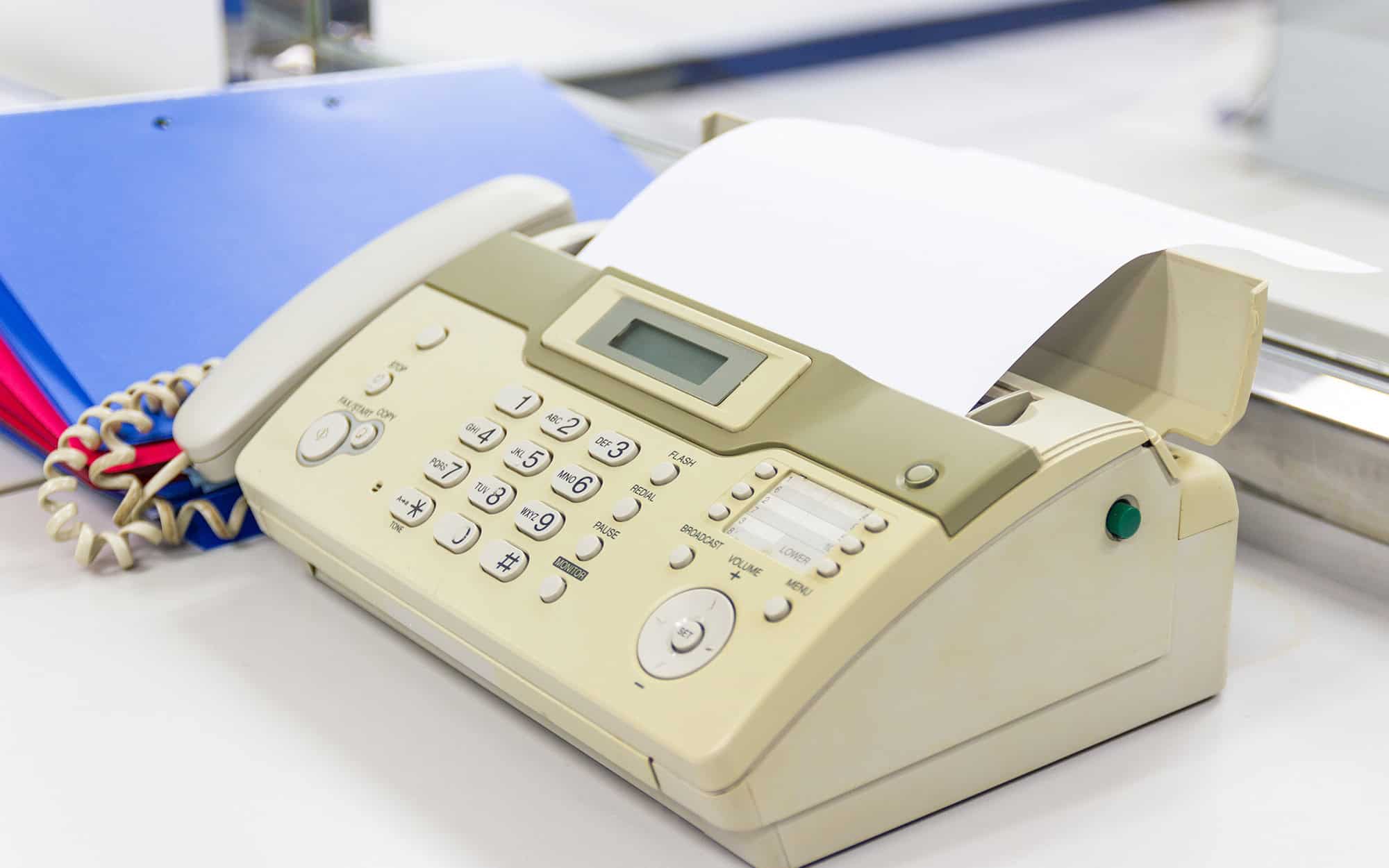 The Fax Machine For Sending Documents In The Office